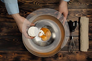 The recipe for tiramisu preparation, part second `beating of yolks of egg`.