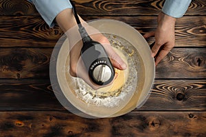 The recipe for tiramisu preparation, part second `beating of yolks of egg`.