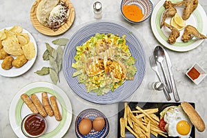 Recipes of dishes and tapas with croquettes of various flavors, salad with goat cheese, hamburger with fried egg, Venezuelan photo