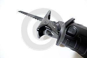 Reciprocating saw with a blade isolated in a white background