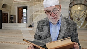 Reciting Quran In Holder