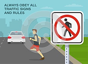 Reckless male pedestrian running across the road. Always obey all traffic signs and rules. No pedestrian crossing sign.