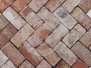 Reclaimed house bricks in a herringbone pattern