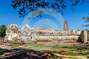 Reclining Buddha Ayutthaya total view with leafs and beautiful s
