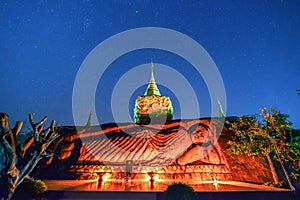 Reclining Buddha Carved from stone,Sakonnakhon,Thailand.