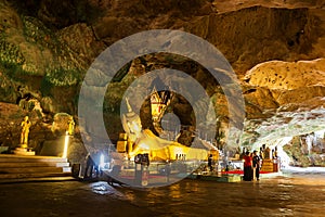 Reclining Buddha in cave Wat Suwan Khuha temple, Phang-nga