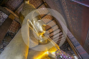 Reclining Buddha gold statue face