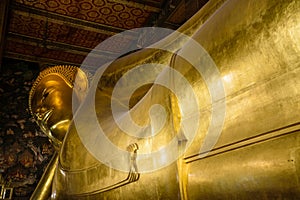 Reclining Buddha gold statue. Wat Pho, Bangkok.