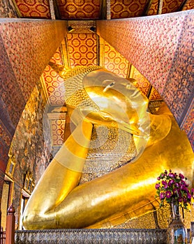 Reclining Buddha Gold Statue at Wat Pho, Bangkok, Thailand