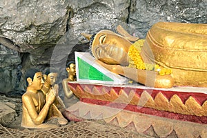 Reclining Buddha statue in Elephant Cave ( Tham Sang ) Laos