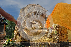 Reclining Buddha statue at the Wat Lokayasutharam temple Phra Noon in the Ayutthaya historical site in central Thailand