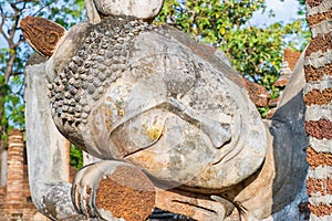 Reclining Buddha statue at Wat Phra Kaeo temple in Kamphaeng Phet Historical Park, UNESCO World Heritage site