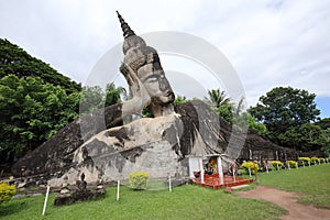 Reclining Buddha Statue in Wat Xieng Khuan Buddha park.