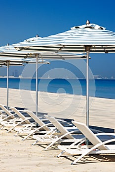 Reclining deck chairs on the beach