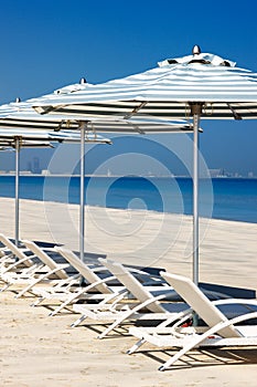 Reclining deck chairs on the beach