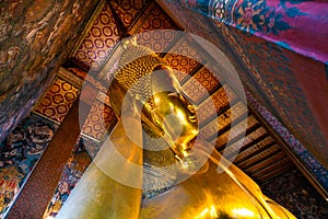 Reclining golden buddha inside of pagoda Wat Pho