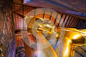 Reclining golden buddha inside of pagoda Wat Pho