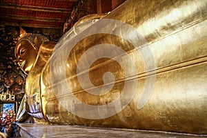 Reclining golden buddha of wat pho, Phra Nakhon District, Bangkok, Thailand.