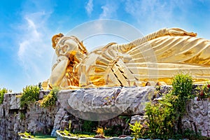 Reclining guanyin or Kuan Yin statue at Wat Tham Panyaram temple Sam Phran City Nakhon Pathom, Thailand