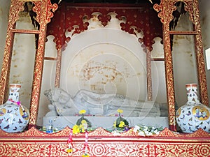 Reclining lanna buddha at Northern Thailand temple