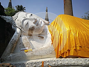 The reclining white Buddha statues or nirvana located at Wat Yai Chaimongkol, Thailand.