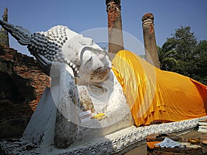 The reclining white Buddha statues or nirvana located at Wat Yai Chaimongkol, Thailand.