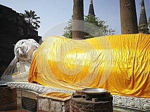 The reclining white Buddha statues or nirvana located at Wat Yai Chaimongkol, Thailand.