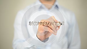 Recommendations, Man Writing on Transparent Screen photo