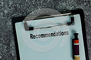 Recommendations write on a paperwork on the table. Business concept photo