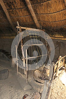 A reconstructed iron age loom in a round house located at Castell Henllys Iron Age Hill Fort photo
