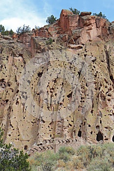 Reconstructed pueblo on cliffs at Bandelier National Monument, New Mexico