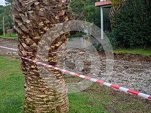 Reconstruction of the bike path. Replacing tiles on a bike path among palm trees. Infrastructure of the resort town. Repair