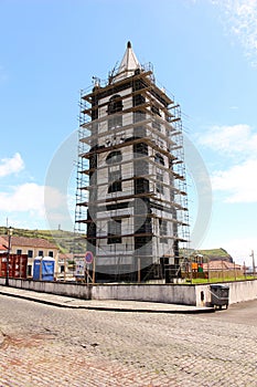 Reconstruction of the clock tower Torre do Relogio in Horta. Faial Island photo