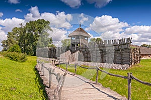 Reconstruction of the defensive shaft and gate to the Lusatian settlement in archeological museum in Biskupin Poland.