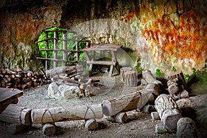 Reconstruction of Prehistoric, paleolithic cave or cavern, Parco delle Cascate, Italy photo