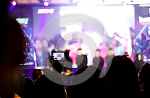 record event on stage with digital camera and live to social streaming for broadcast.