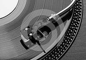 Record player playing vinyl