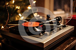 a record player spinning a vinyl of christmas carols