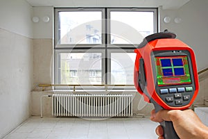 Recording Radiator and a window on a building with Thermal Camer