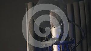 In a recording studio. Vocal microphone prepared to recording voice