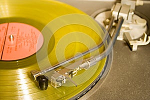 Recordplayer with yellow lp photo
