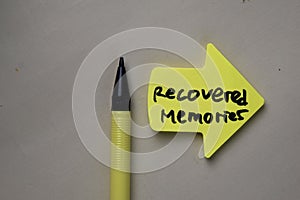 Recovered Memories write on sticky notes isolated on office desk