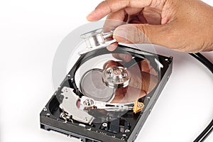 RECOVERY AND REPAIR TECHNOLOGY CONCEPT: Hard Disk Drive HDD with stethoscope isolated on white.