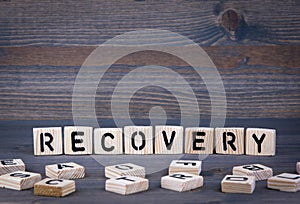 Recovery word written on wood block
