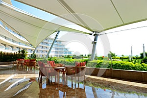 The recreation chairs on terrace at luxury hotel