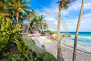 Recreation at paradise beach resort with turquoise waters of Caribbean Sea at Tulum, close to Cancun, Riviera Maya, tropical