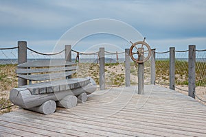 Recreation place in the shape of a ship deck with a steering wheel.