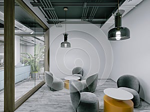 Recreation and waiting area in an open office with upholstered furniture