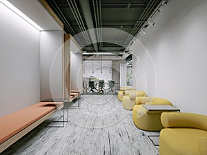 Recreation and waiting area in an open office with upholstered furniture