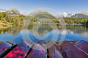 Recreational boats on Strbske Lake shore in Slovakia.